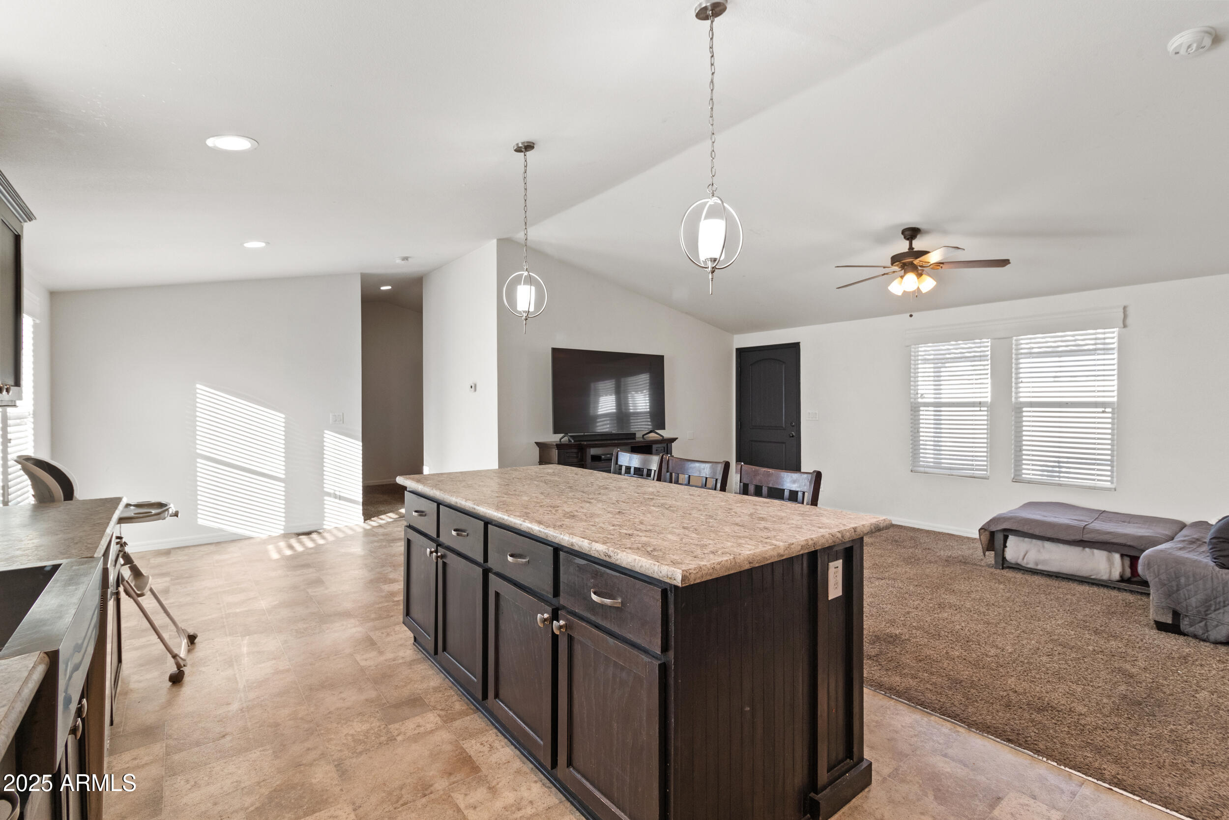 400 West Baseline Road, Unit 281 Tempe, AZ 85283 - Photo 6 of 54 a large kitchen with kitchen island a large island in it