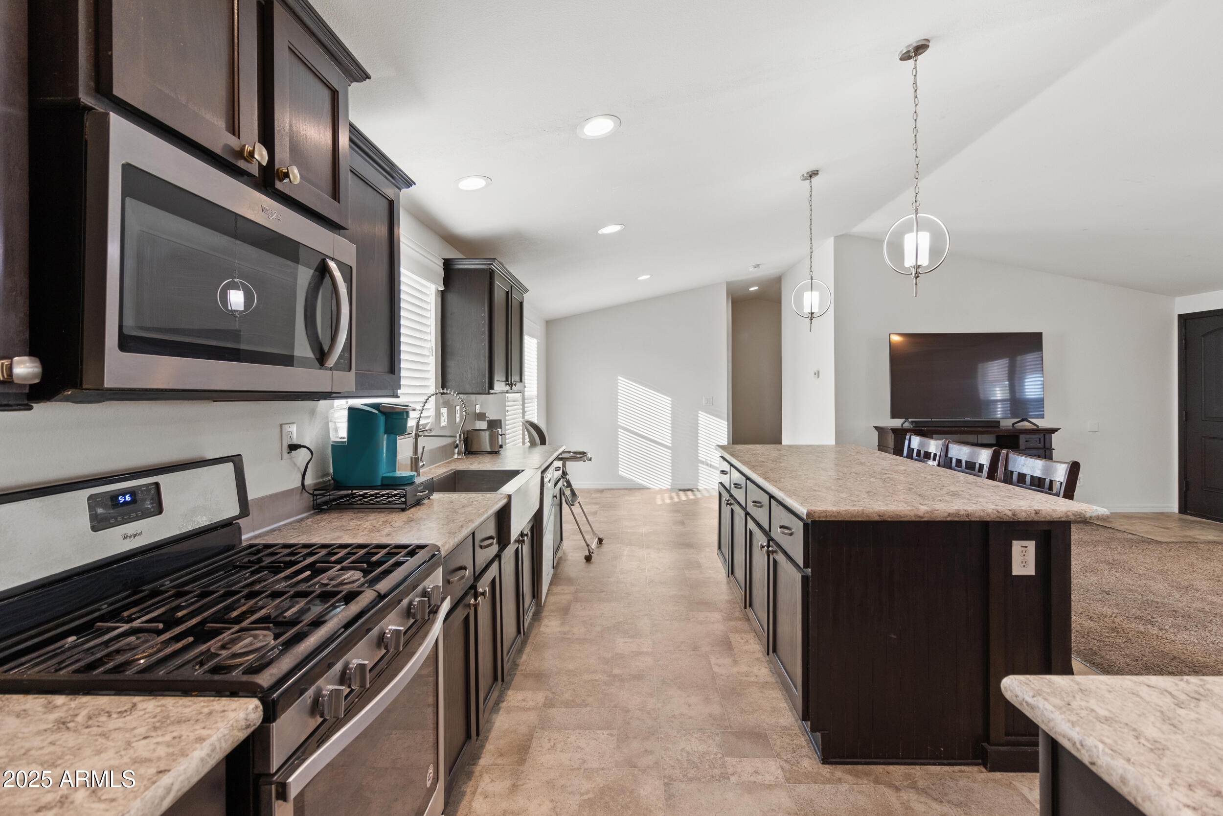 400 West Baseline Road, Unit 281 Tempe, AZ 85283 - Photo 7 of 54 a kitchen with a stove and a kitchen