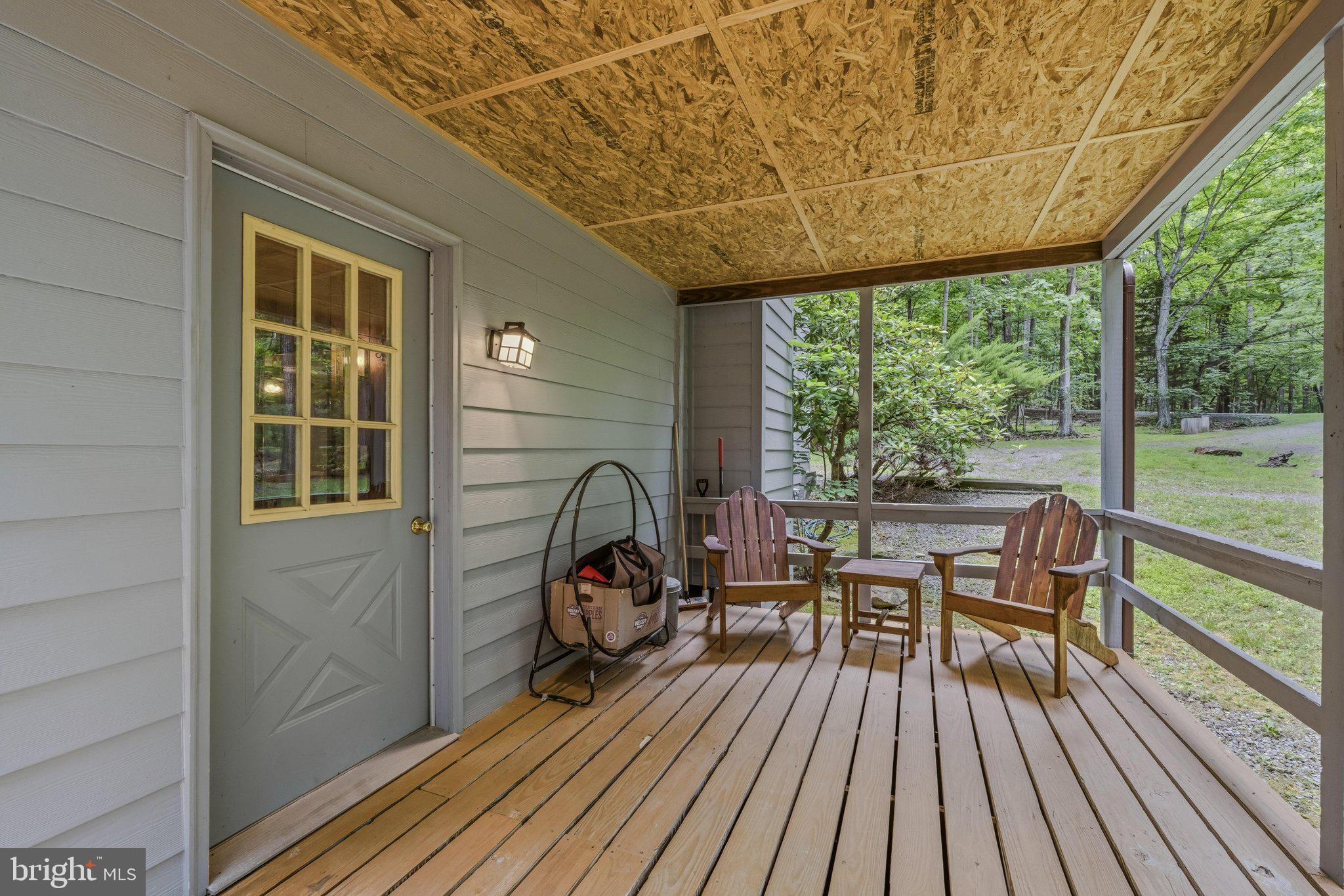 221 Mountainside Road Berkeley Springs, WV 25411 - Photo 5 of 53 Side Door