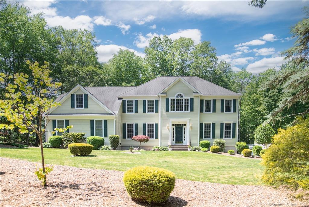 31 Obtuse Rocks Road Brookfield, CT 06804 - Photo 1 of 1 a front view of a house with a yard