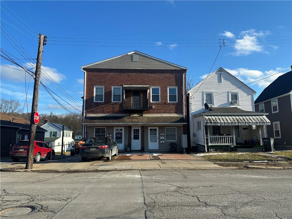 1801 Main Street Aliquippa, PA 15001 - Photo 3 of 3 a front view of a house with a yard