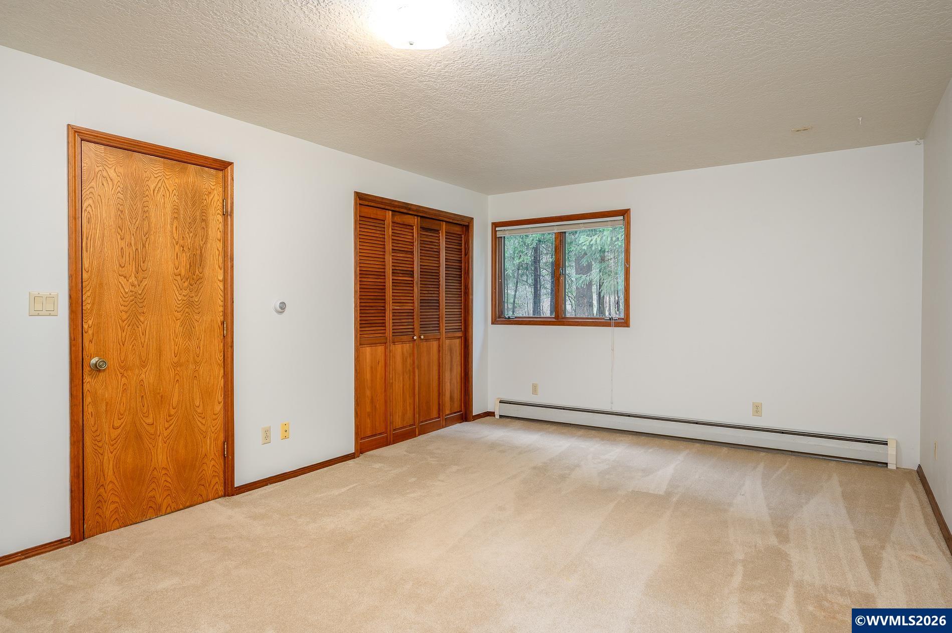 27572 South Kinzy Road Estacada, OR 97023 - Photo 27 of 50 an empty room with windows
