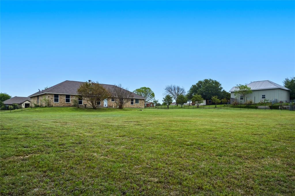 100 Pinnacle Circle Aledo, TX 76008 - Photo 29 of 30 a view of a green field with house in the background