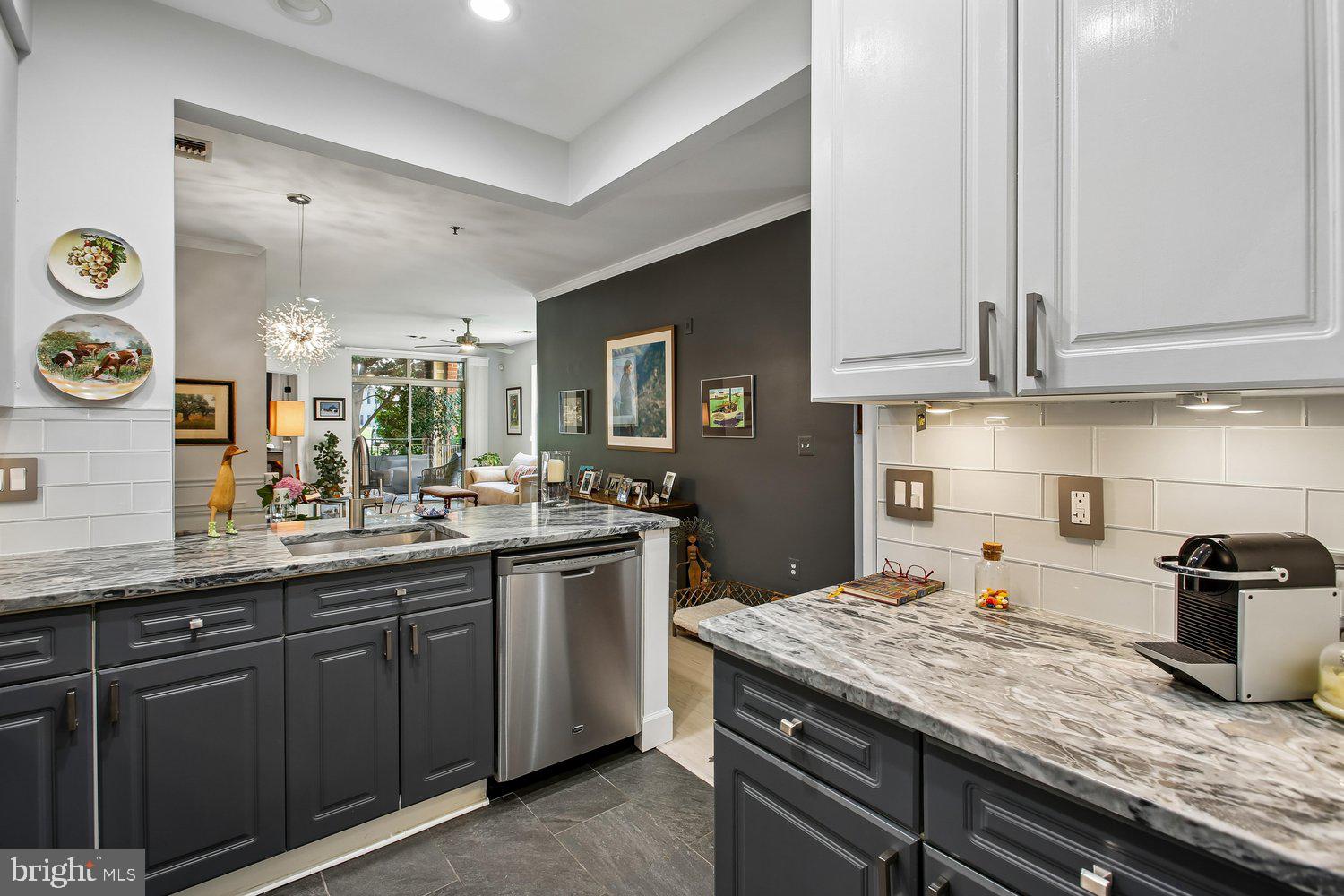1855 Stratford Park Place, Unit 103 Reston, VA 20190 - Photo 11 of 49 Marble counter tops for our bakery fans.