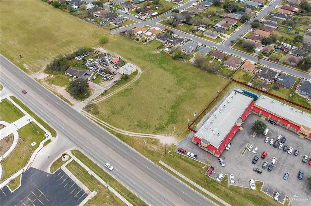 1002 East Nolana Loop Pharr, TX 78577 - Photo 4 of 6 an aerial view of residential houses with outdoor space