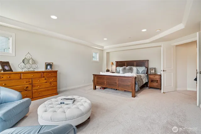 a bedroom with furniture and a bed