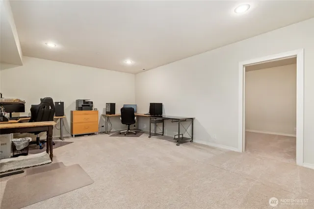 a room with furniture and a desk