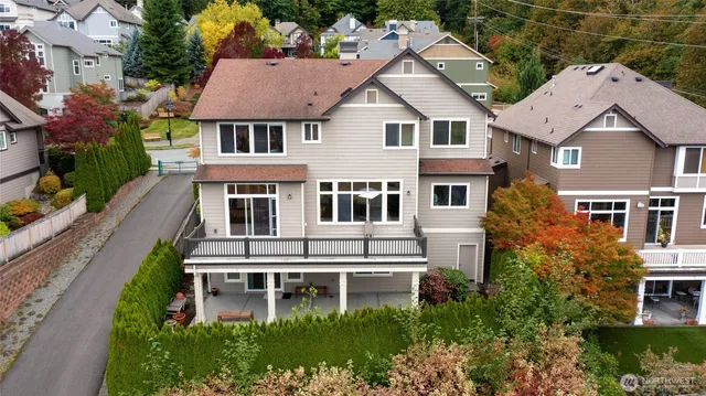 an aerial view of a house with a garden and plants