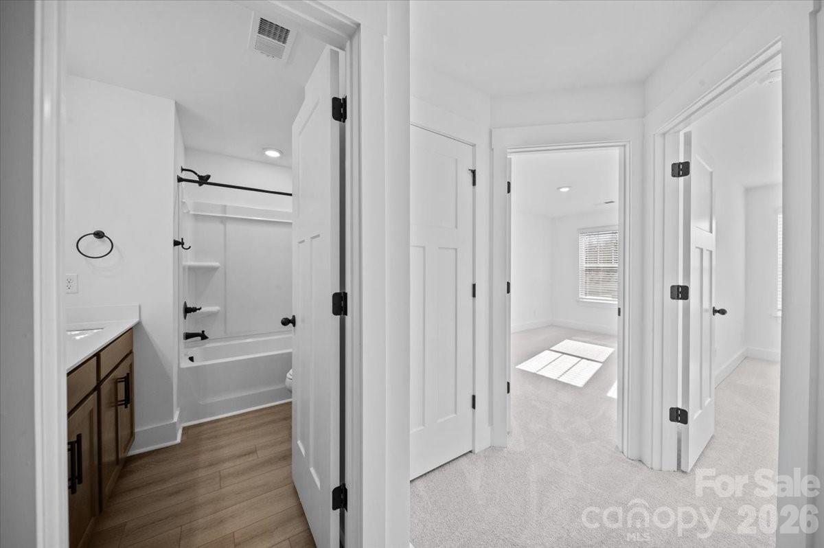 47 Moon Hvn Way Arden, NC 28704 - Photo 13 of 30 a bathroom with a bathtub and a shower