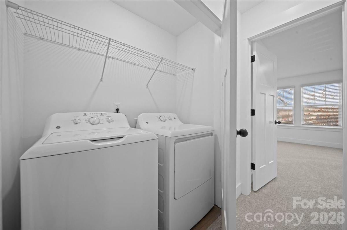 47 Moon Hvn Way Arden, NC 28704 - Photo 23 of 30 a utility room with dryer and washer