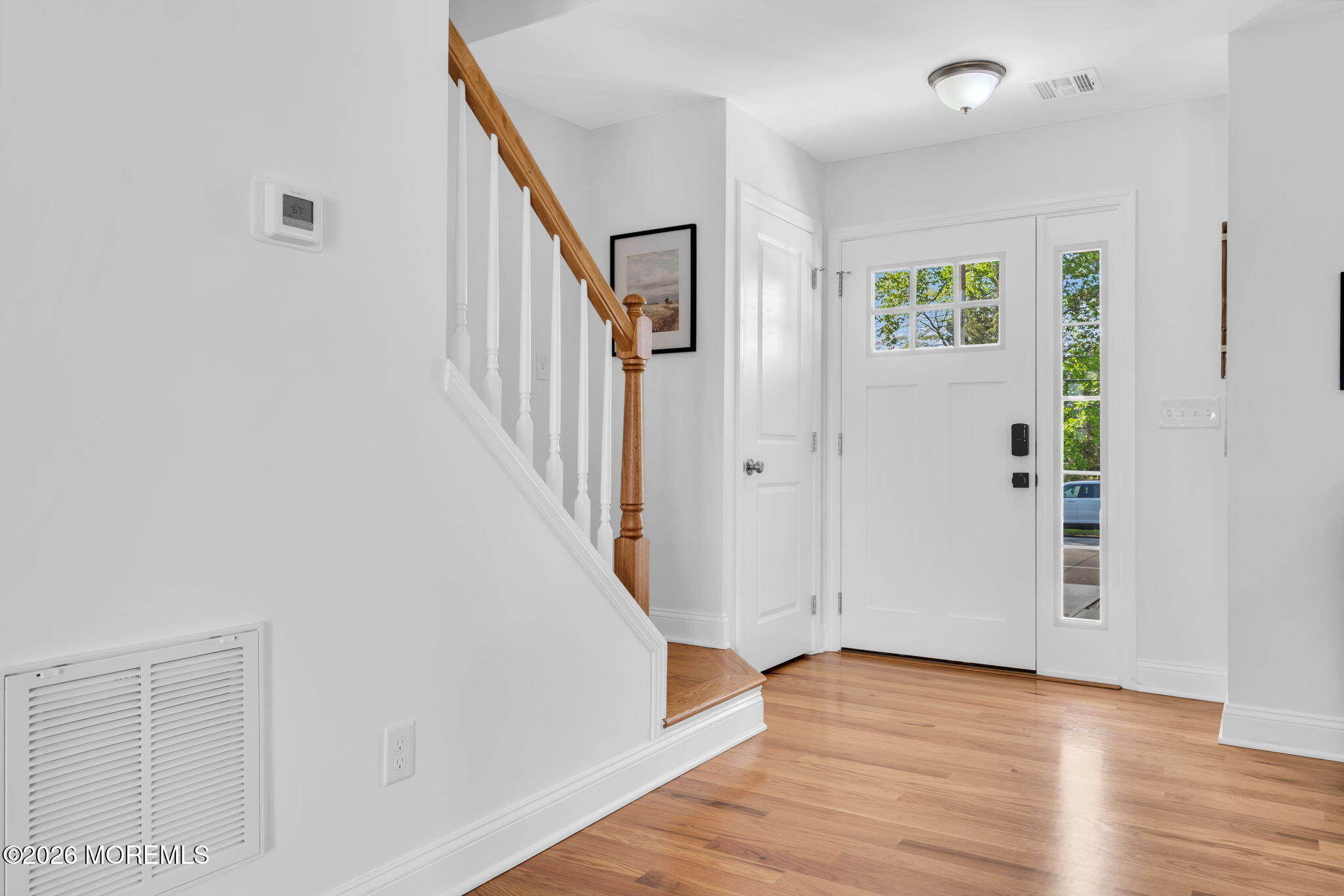 312 Beach Boulevard Forked River, NJ 08731 - Photo 5 of 40 a view of a hallway with wooden floor and entryway
