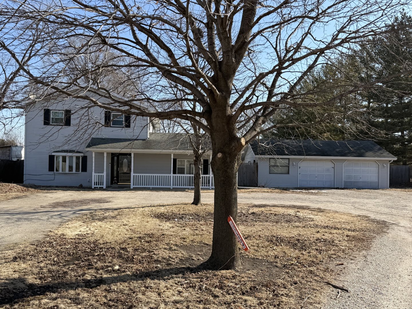 2740 Highway 47 Morris, IL 60450 - Photo 1 of 1 a large tree in front of a white house