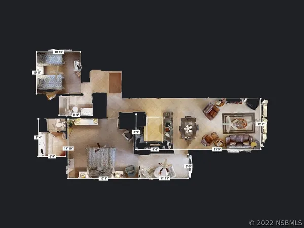 a view of a hallway with a livingroom and furniture