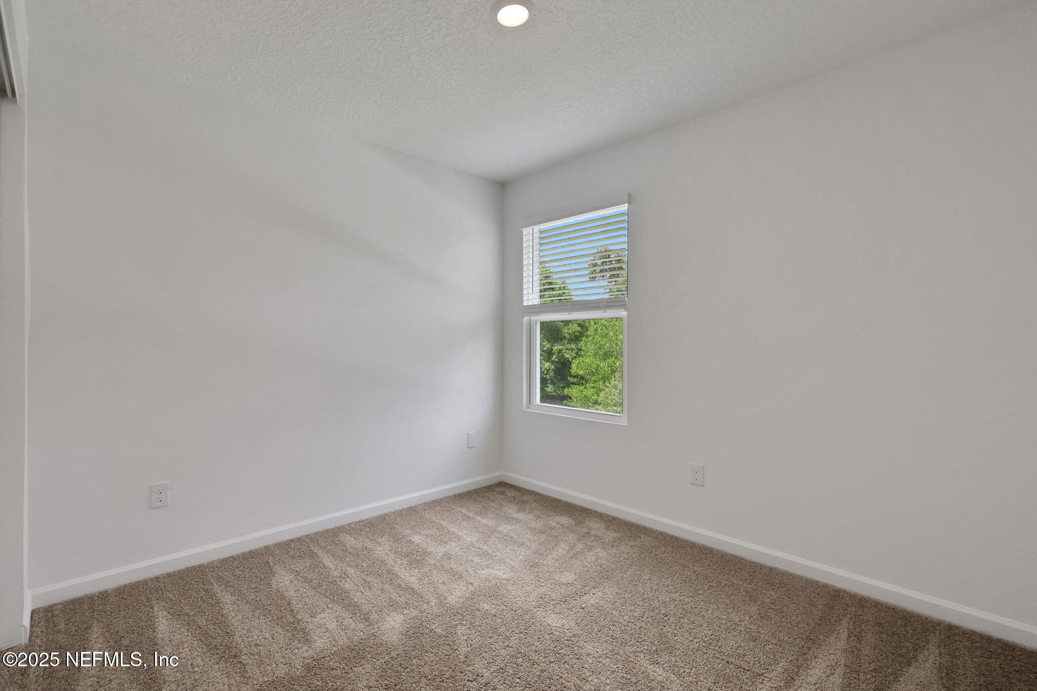 720 Sailor Grove Lane Jacksonville, FL 32221 - Photo 21 of 32 a view of an empty room with a window