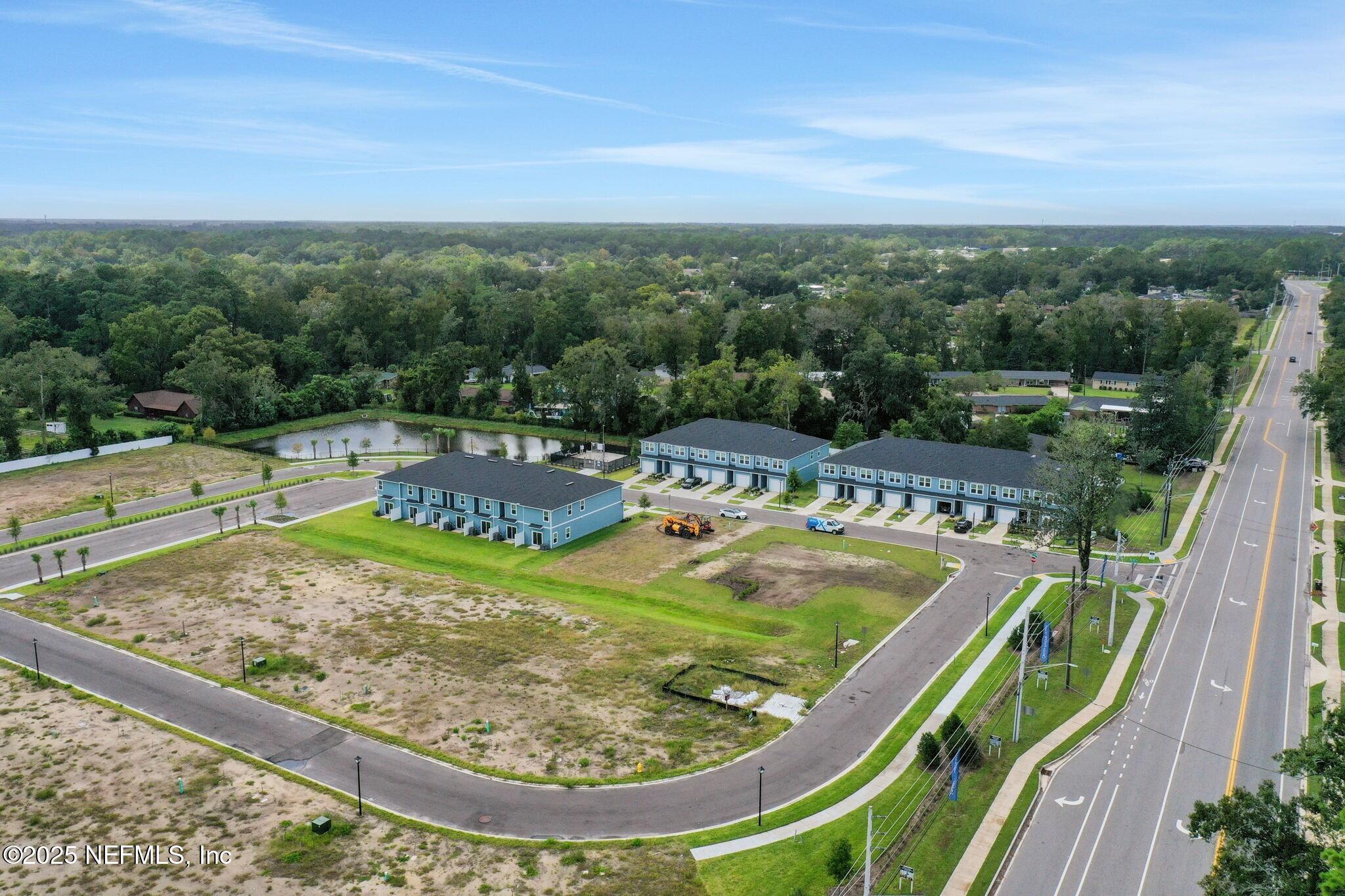 720 Sailor Grove Lane Jacksonville, FL 32221 - Photo 31 of 32 a view of swimming pool with a garden and seating area