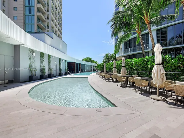 a view of a balcony with chairs
