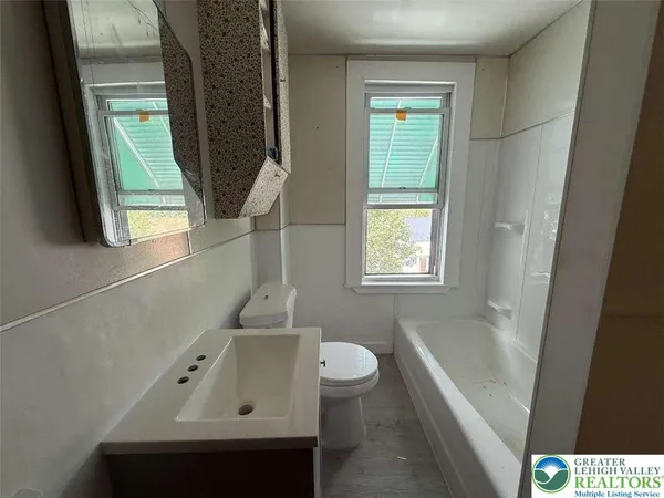 a view of empty room with a window