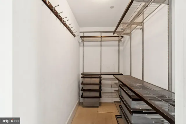 a view of an empty room with stairs