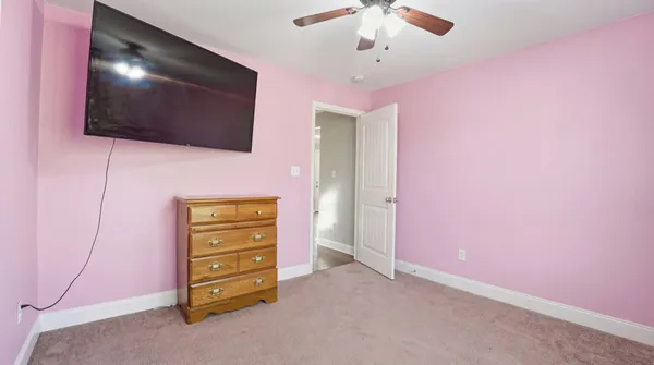 en empty room with a flat screen tv