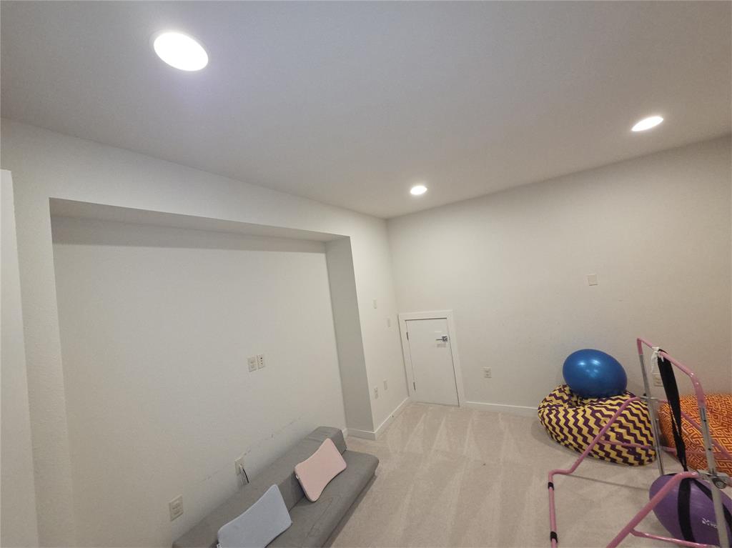 5100 Naphill Road McKinney, TX 75070 - Photo 15 of 22 a room with furniture and wooden floor