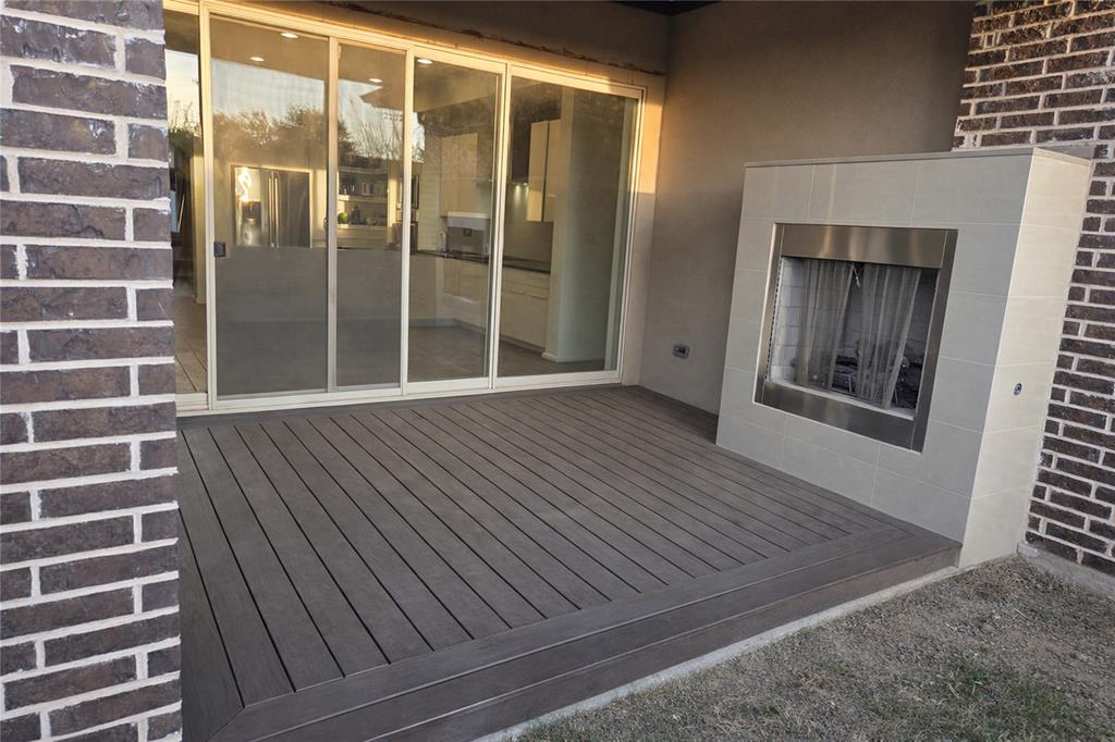 5100 Naphill Road McKinney, TX 75070 - Photo 4 of 22 a view of outdoor space with wooden floor and windows