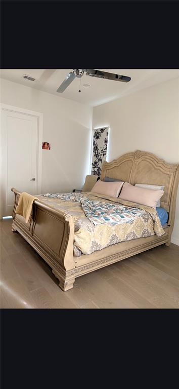 5100 Naphill Road McKinney, TX 75070 - Photo 9 of 22 a bedroom with a bed and a night stand