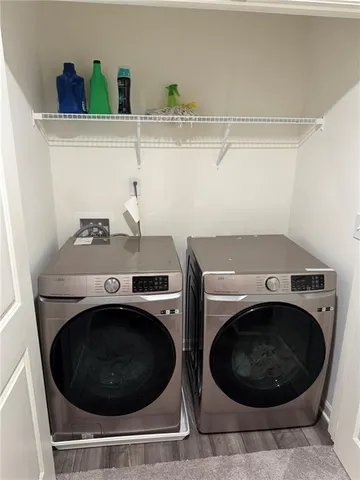 a bedroom with a bed tv and window