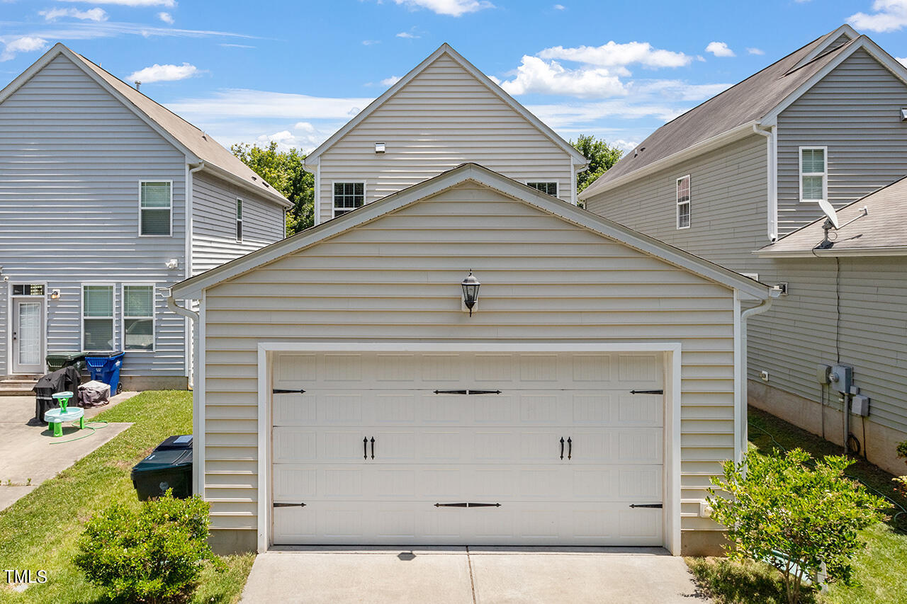 942 Ileagnes Road Raleigh, NC 27603 - Photo 24 of 24 Private Garage Backing Up to Wooded Area