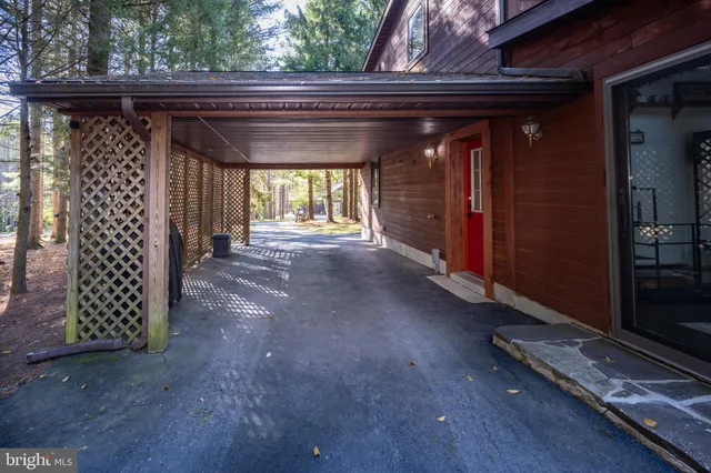a bedroom with a bed and a table