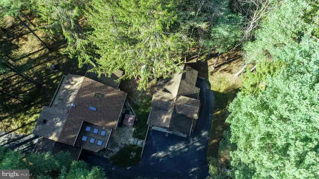 a view of a house with a yard porch and sitting area