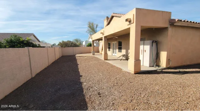 a view of a house with a street