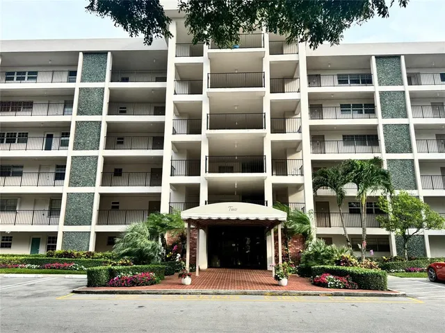 a view of a building with a street