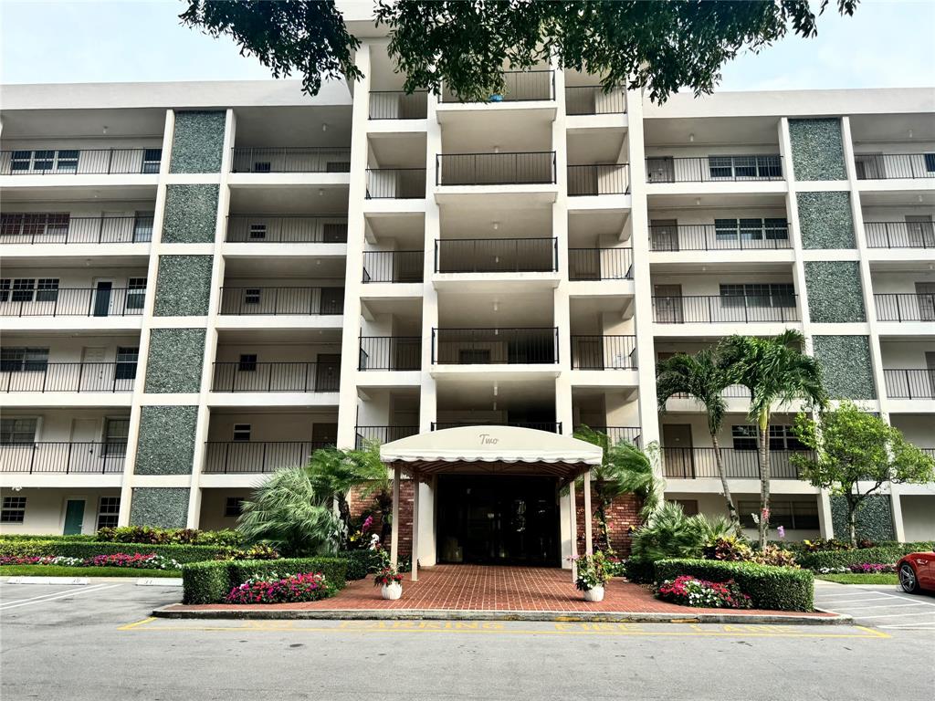 a view of a building with a street