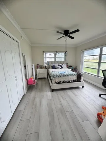 a kitchen with granite countertop a stove top oven sink and cabinets