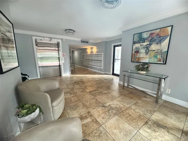 a living room with furniture and window