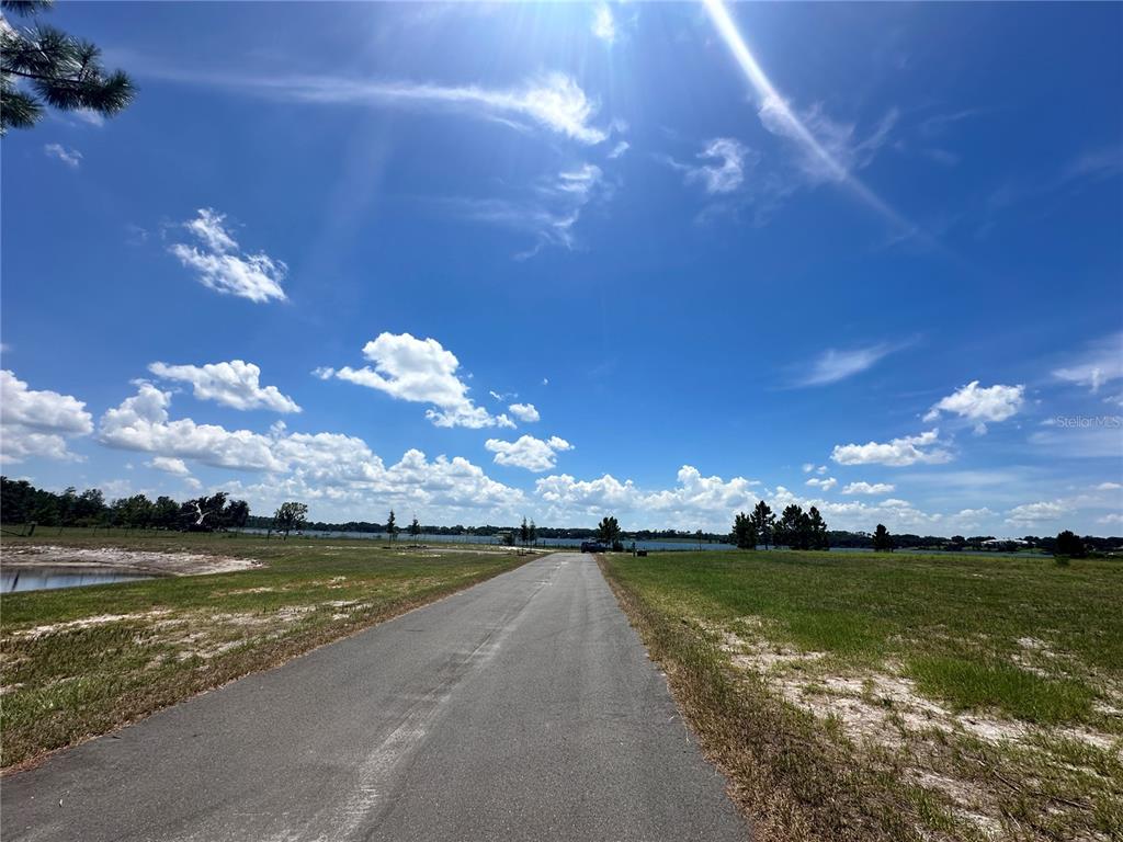 Ranch Gate Boulevard Umatilla, FL 32784 - Photo 20 of 33 a view of a lake in middle of the house