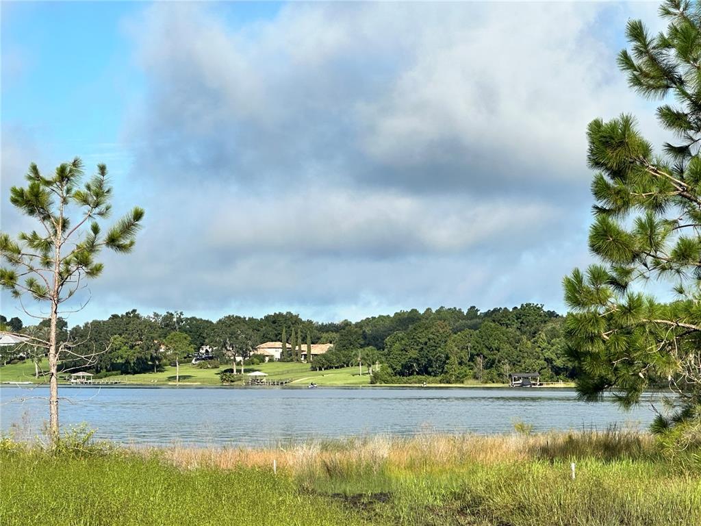 Ranch Gate Boulevard Umatilla, FL 32784 - Photo 24 of 33 a view of a lake with beach
