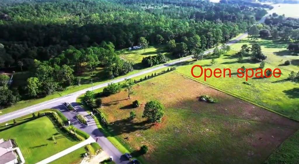Ranch Gate Boulevard Umatilla, FL 32784 - Photo 4 of 33 a view of a street with a park