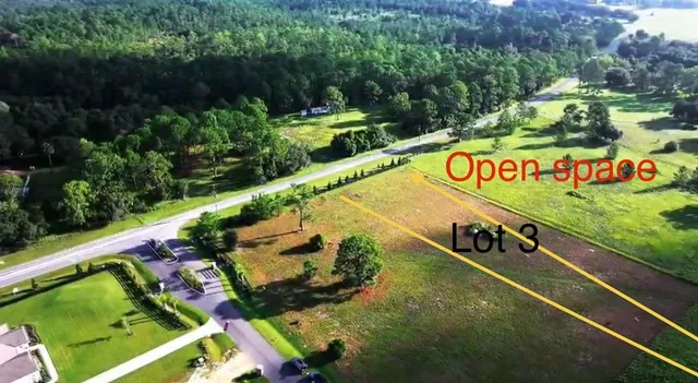 a view of a street with a park