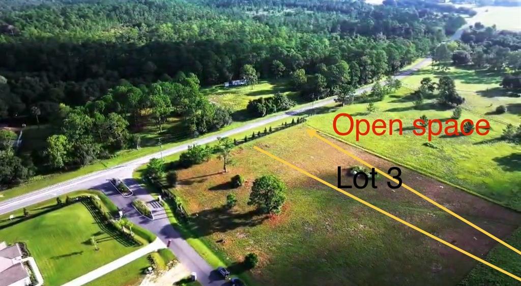 Ranch Gate Boulevard Umatilla, FL 32784 - Photo 5 of 33 a view of a street with a park