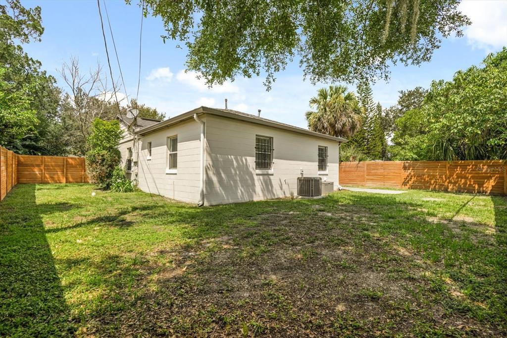 720 West Webster Avenue Winter Park, FL 32789 - Photo 19 of 22 a white house that has tree in front of it