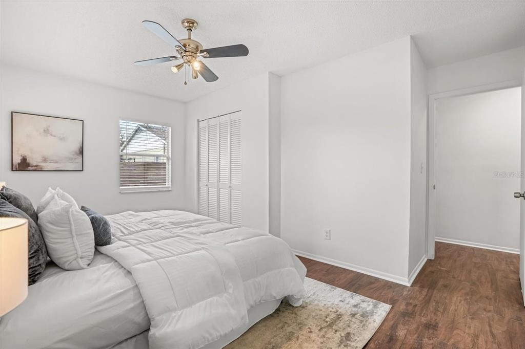 720 West Webster Avenue Winter Park, FL 32789 - Photo 10 of 22 a bedroom with a bed and window