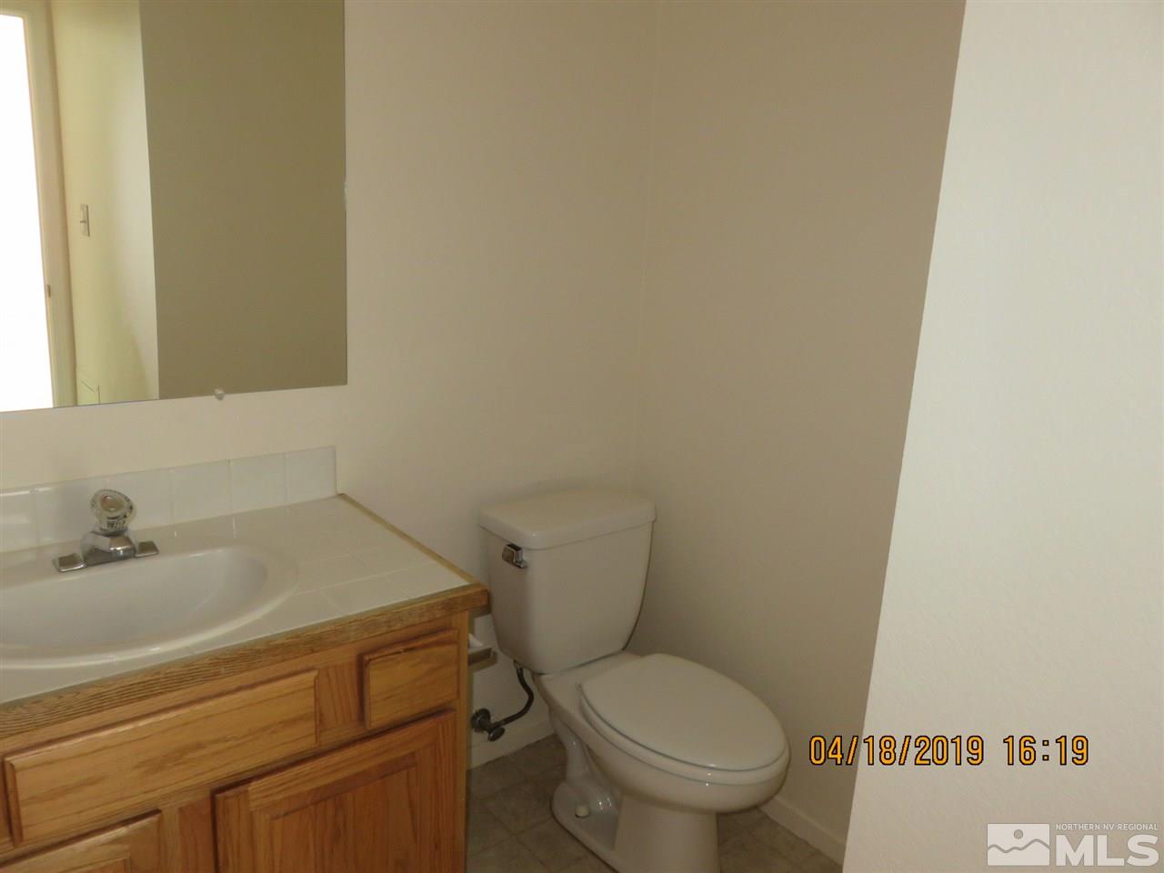 591 Tarn Way Reno, NV 89503 - Photo 5 of 8 a bathroom with a sink and a toilet