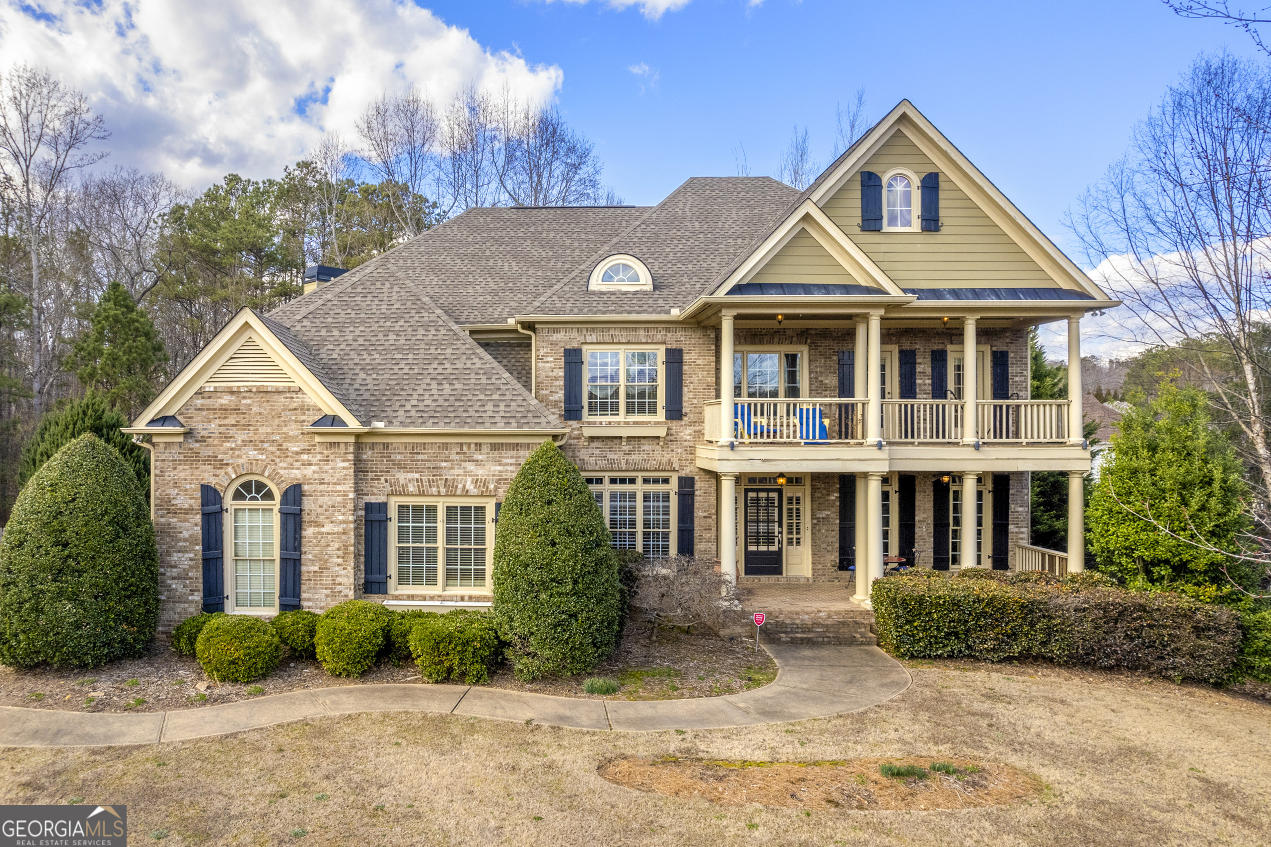 304 Wildflower Walk Canton, GA 30114 - Photo 1 of 1 a front view of a house with a yard