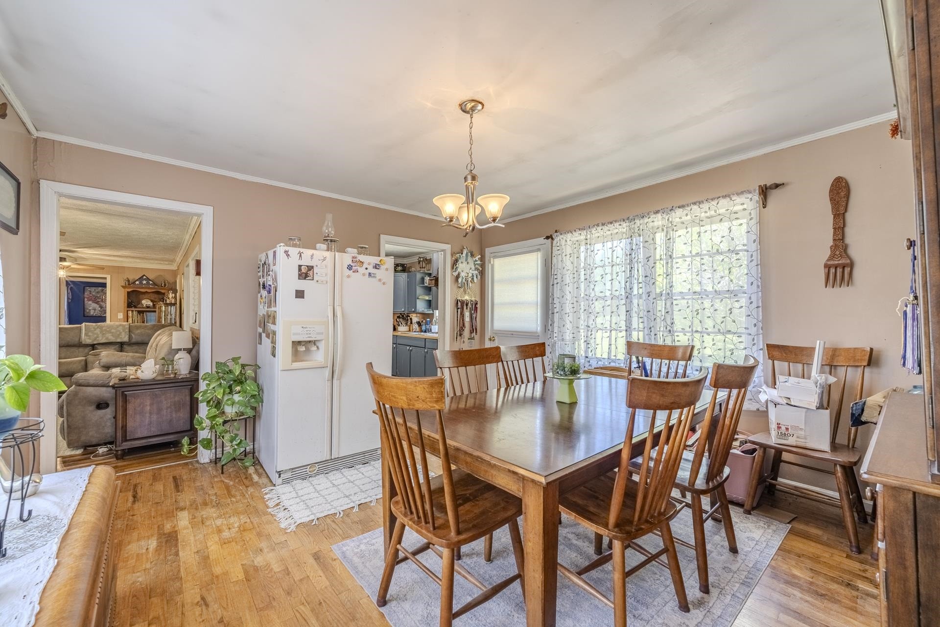 2884 Sandy Flat Road Bethel Springs, TN 38315 - Photo 21 of 40 a dining room with furniture window and wooden floor