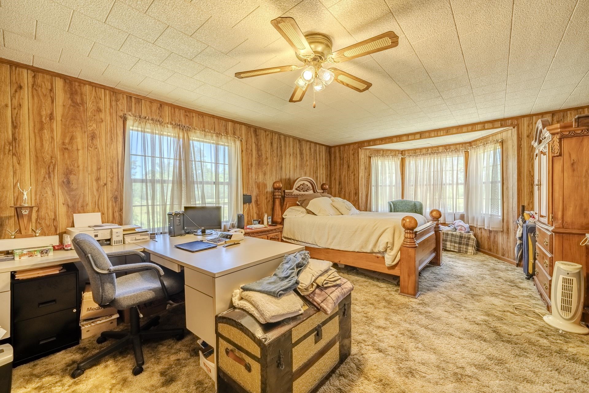 2884 Sandy Flat Road Bethel Springs, TN 38315 - Photo 35 of 40 a bedroom with a bed and a table in it