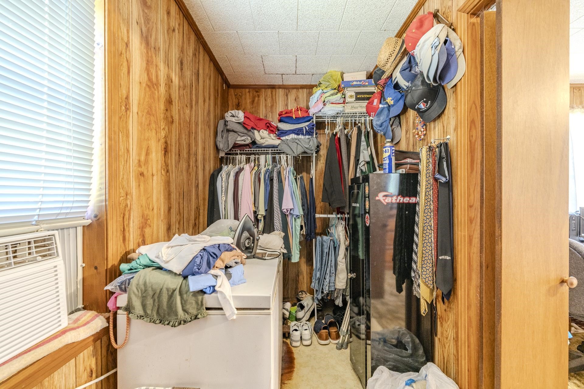 2884 Sandy Flat Road Bethel Springs, TN 38315 - Photo 37 of 40 a view of walk in closet with clothes and shoes