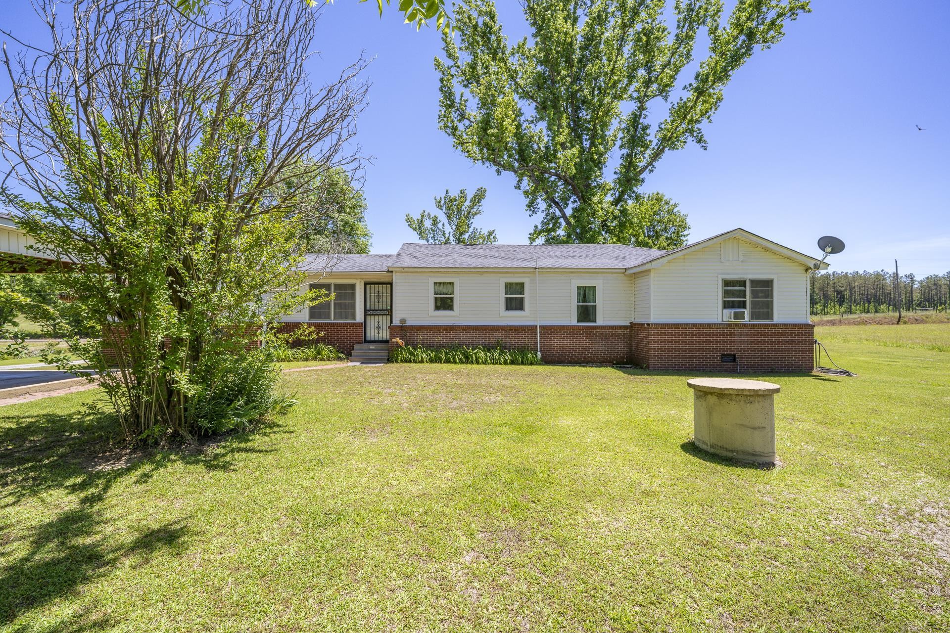 2884 Sandy Flat Road Bethel Springs, TN 38315 - Photo 39 of 40 a front view of house with yard and green space