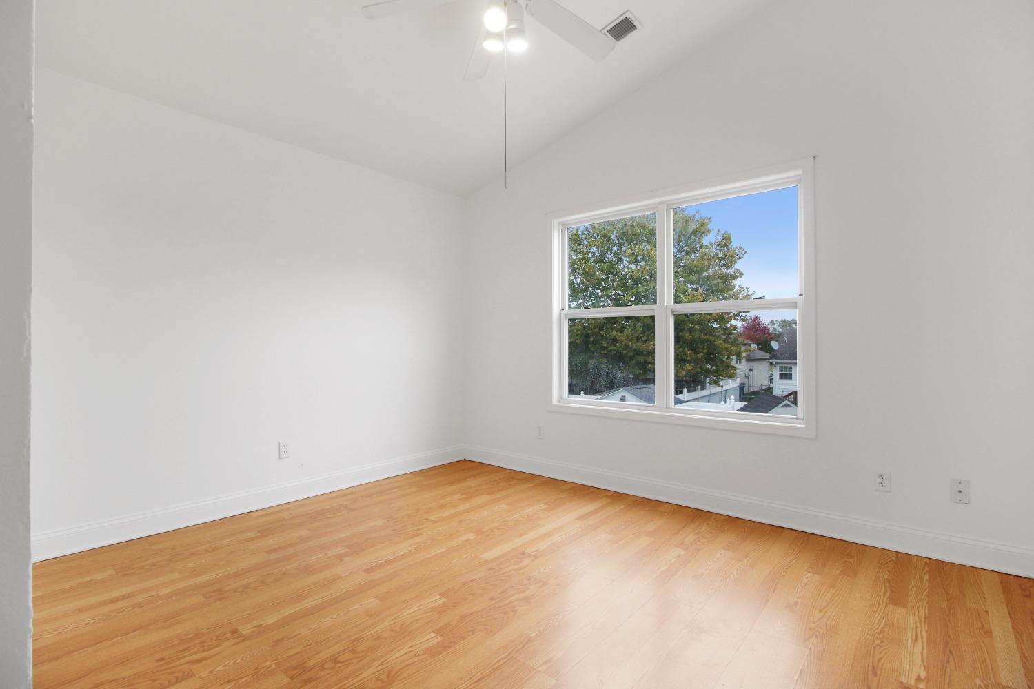 12465 Shelby Place Crown Point, IN 46307 - Photo 16 of 25 an empty room with a window