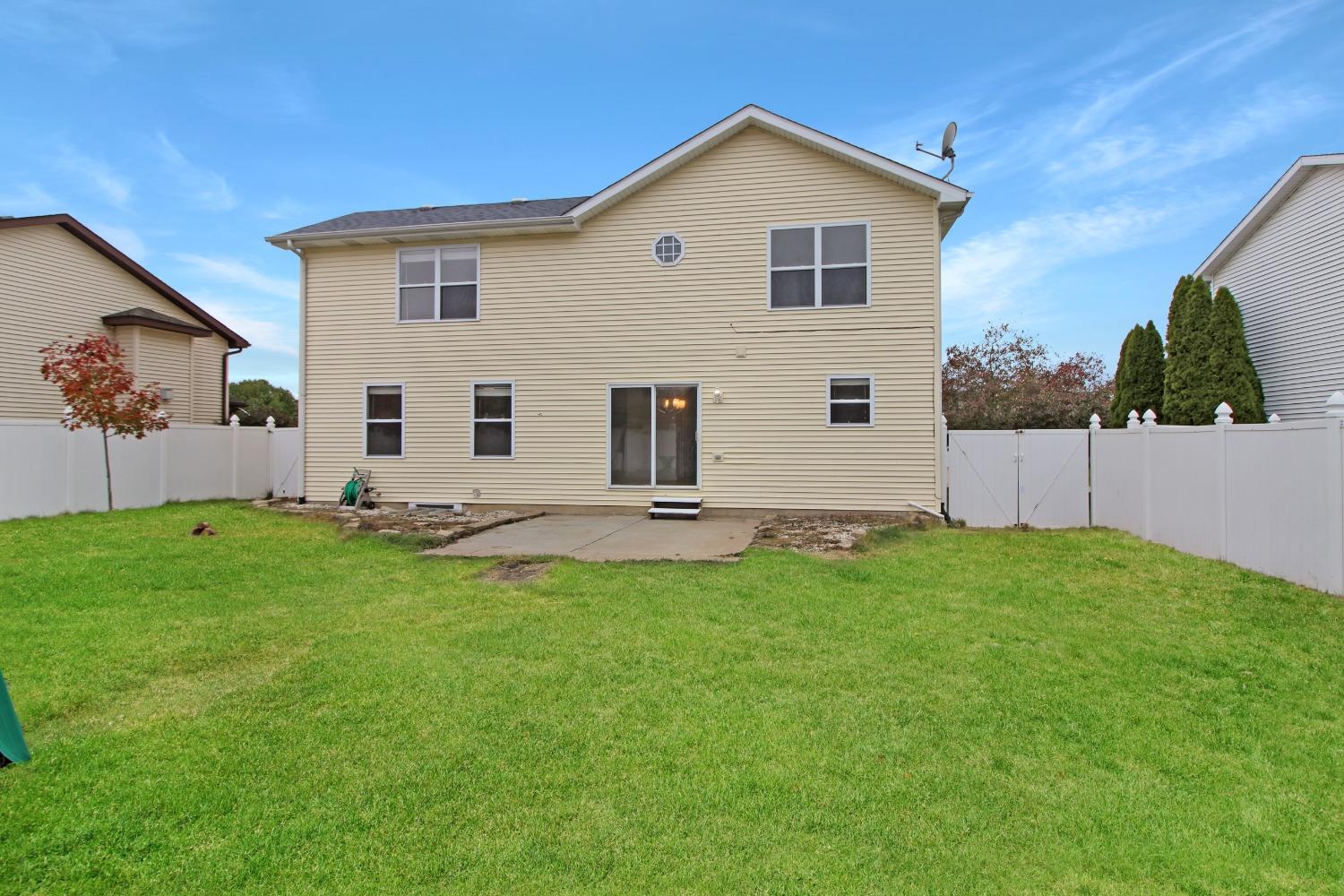 12465 Shelby Place Crown Point, IN 46307 - Photo 7 of 25 a view of an house with backyard space and garden